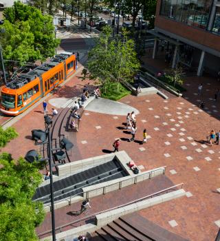 Urban Plaza with streetcar and students