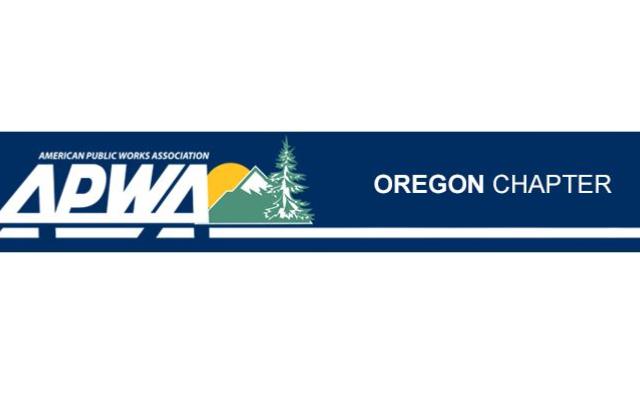 a green mountain and tree, with a partial yellow sun rising behind it. to the left of the graphic, text reads: "American Public Works Association APWA". To the right of the graphic, text reads: "Oregon chapter"