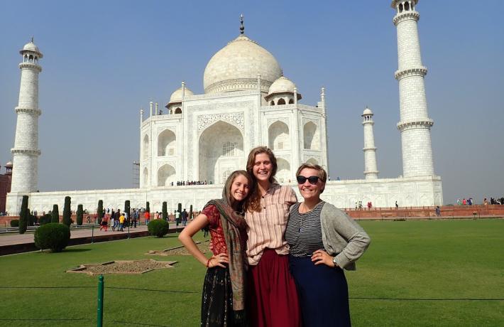Three PSU students standing in front of the Taj Majhal