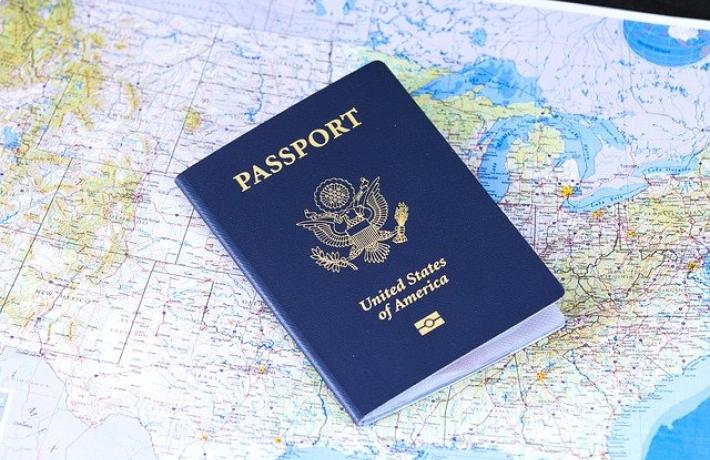 Passport sitting on map of US