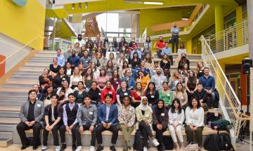 Group photo of BUILD EXITO and URISE students in Karl Miller Center. 