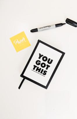 Paper with the words "you got this" written on it.