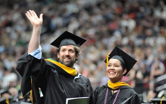 Graduate students at commencement 