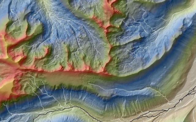 Imagery of elevation zones of mountains and a river valley.
