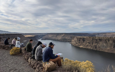 Students overlooking reservoir during field trip