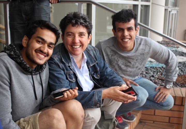 Carol Gabrielli, center, with two students