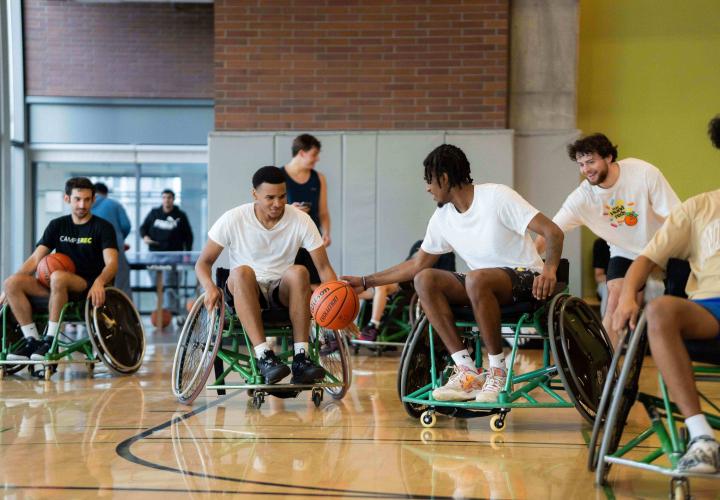 People playing wheelchair basketball
