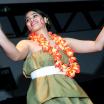 student performing in traditional pacific islander clothing