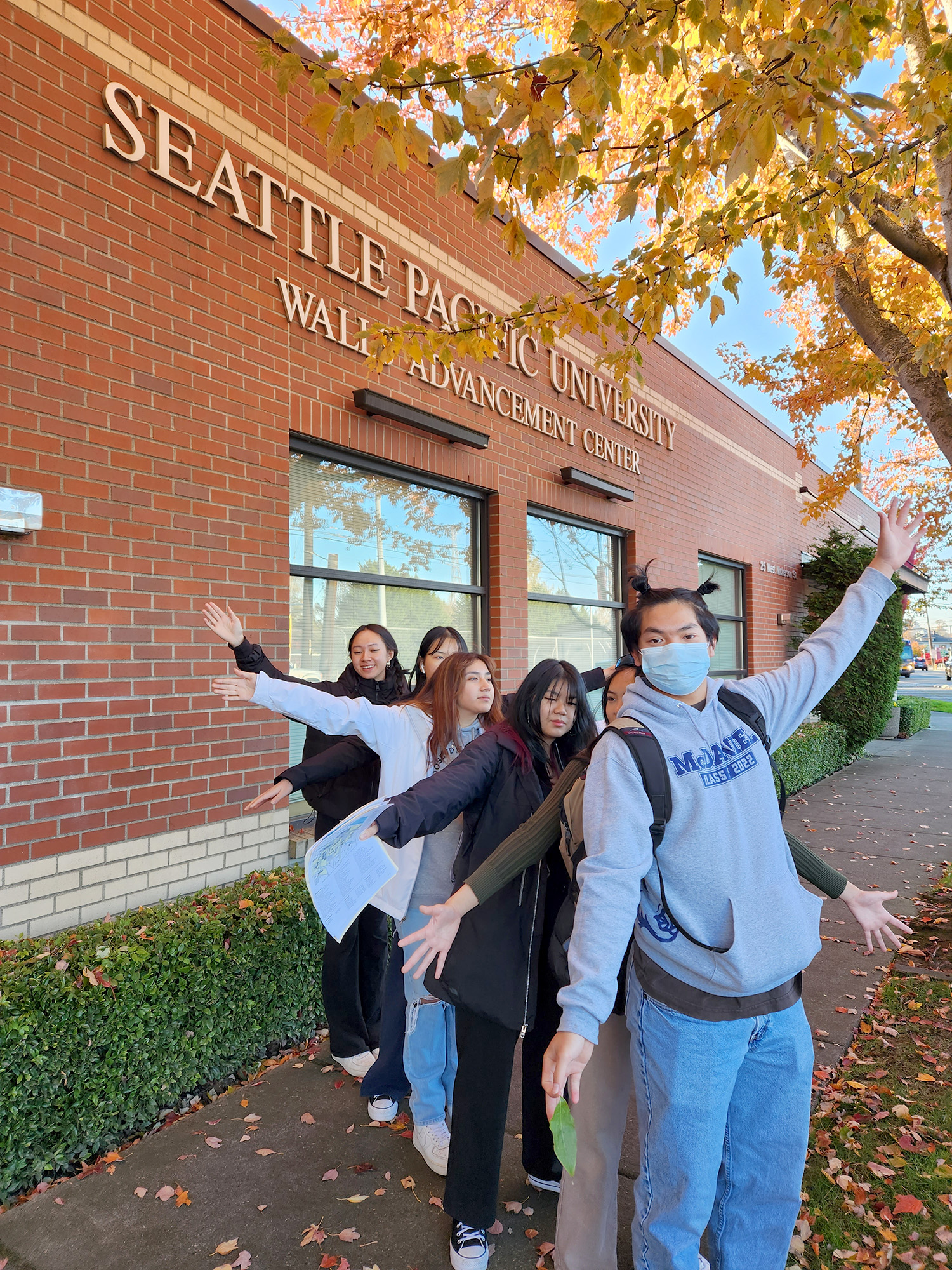 Five TRIO pre-college program students pose during a visit to Seattle Pacific University.