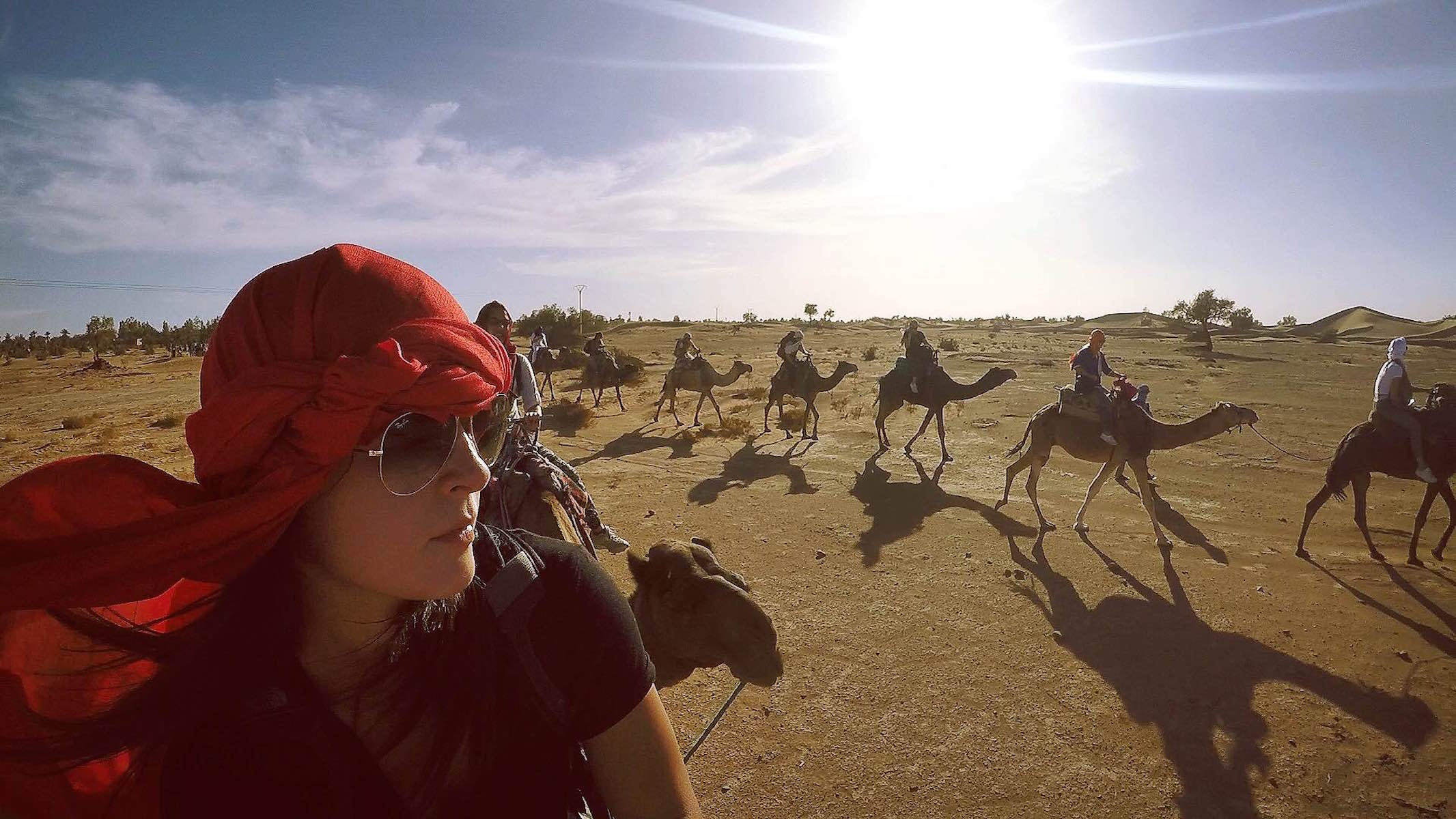 students on camel ride in north africa