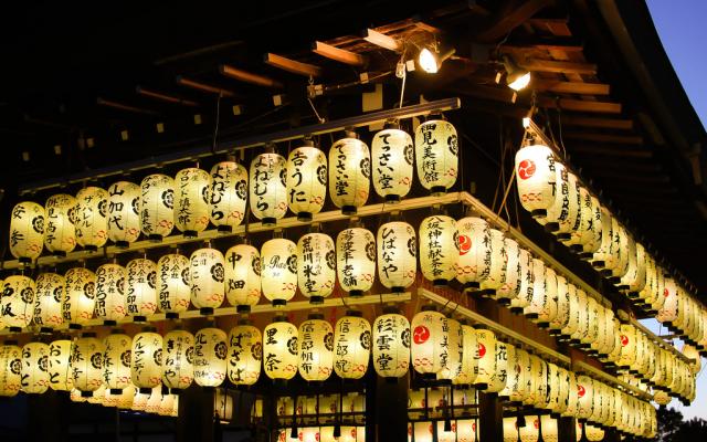 lanterns lit up at shrine in Japan