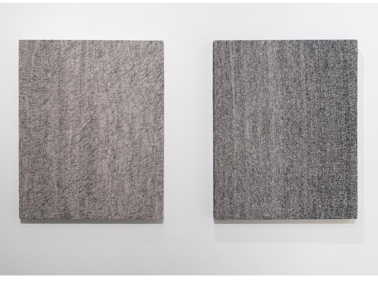 A pair of abstract 2D artworks composed of of grey woven fiber stretched on a canvas, resembling nearly identical paintings hung side by side