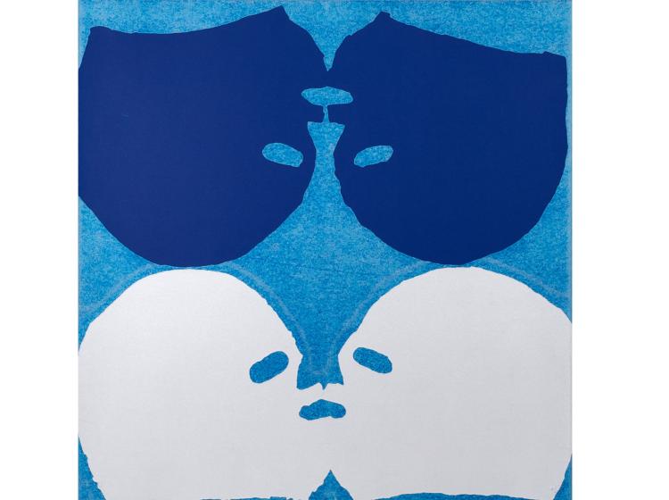 Abstract print of four lachador masks, in navy and white on blue