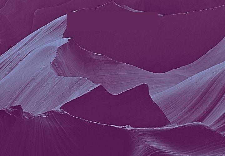 Image of sand dune mountains in purple
