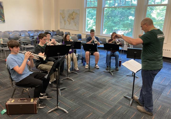 PSU faculty conducting a Summer Brass Academy ensemble.