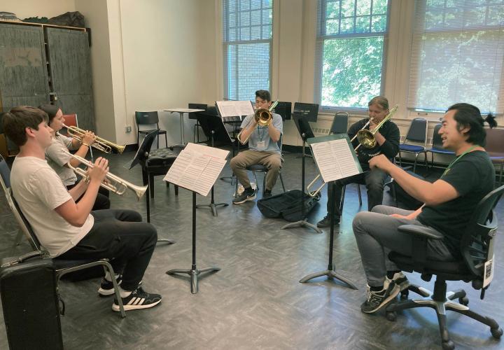 PSU Professor conducting a Summer Brass Academy ensemble.