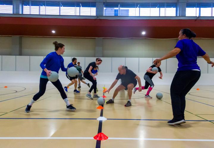 People running to grab dodgeballs