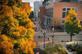 Fall colors on PSU's campus showing the campus rec building and 6th avenue. 