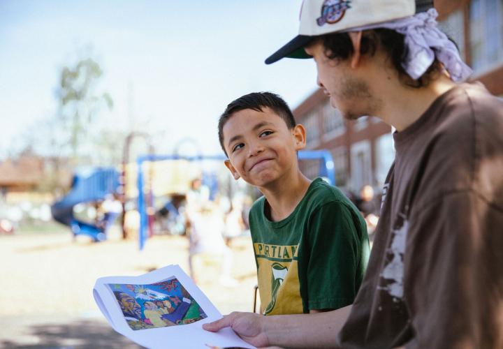 PSU student mentoring child